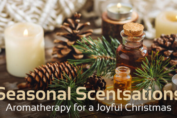 candles and pine cones with aromatherapy bottles, text at the bottom which says 'seasonal scents ations, aromatherapy for a joyful christmas'