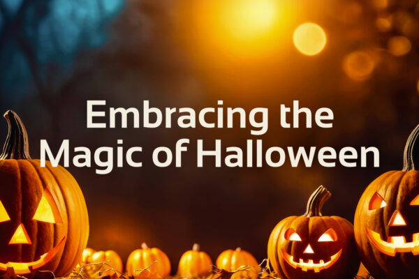 'embracing the magic of Halloween' text with picture of jack o' lantern pumpkin