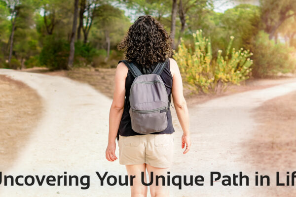 'uncovering your unique path' soul purpose image with woman at fork in road