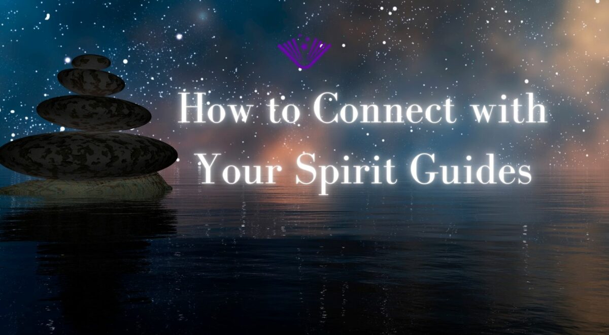 How to Connect with Your Spirit Guides text with background image of stacked rocks with night sky