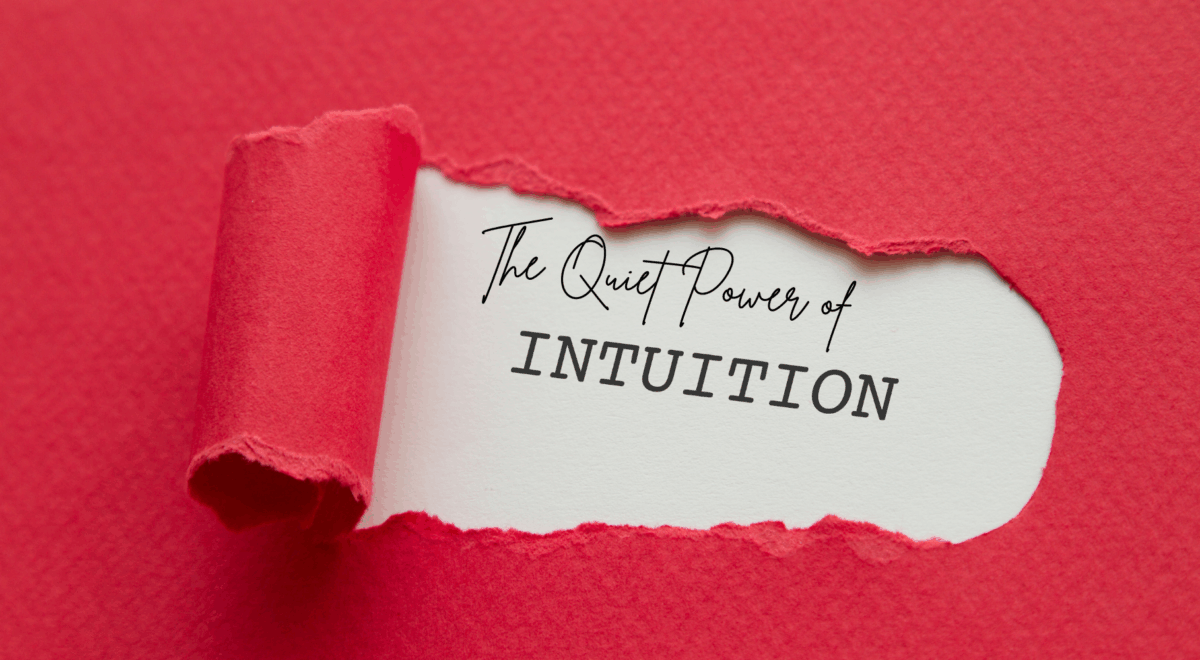 'the quiet power of intuition' text showing through ripped paper