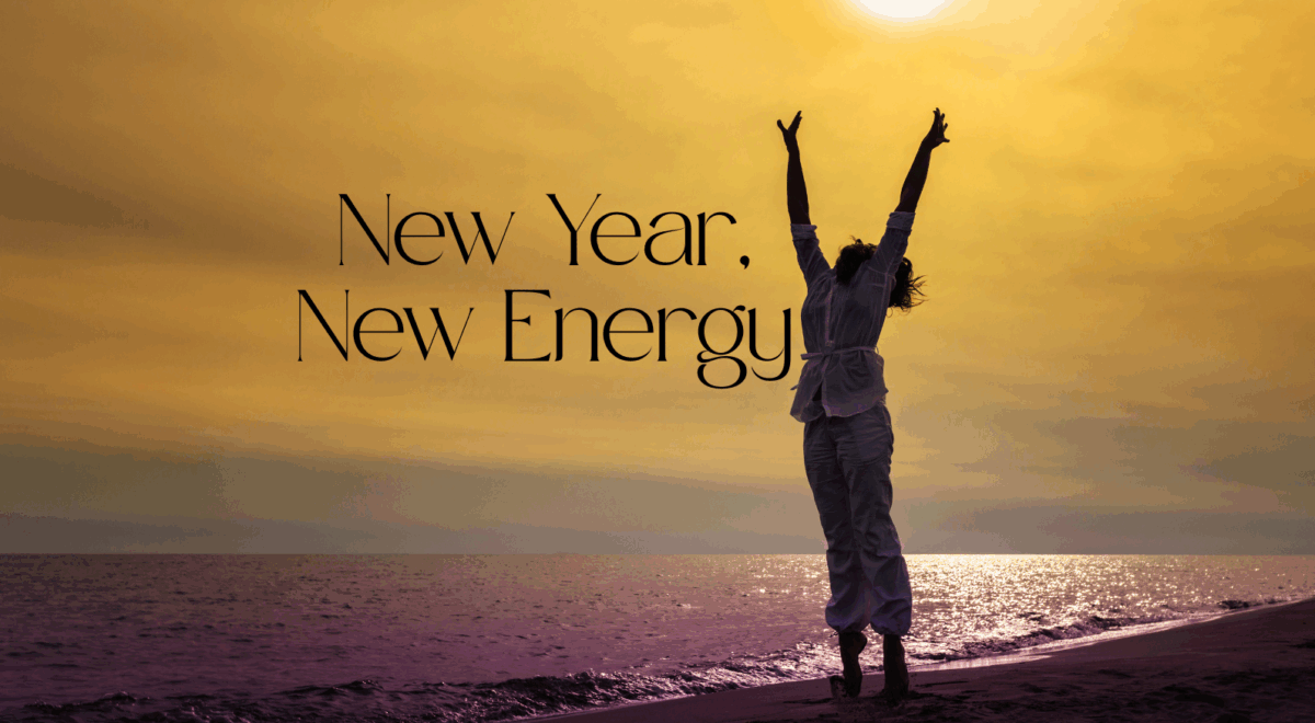 'new year, new energy' text with woman jumping on beach
